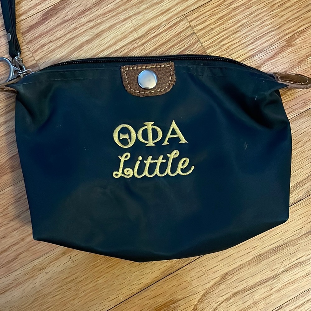 Theta Phi Alpha wristlet